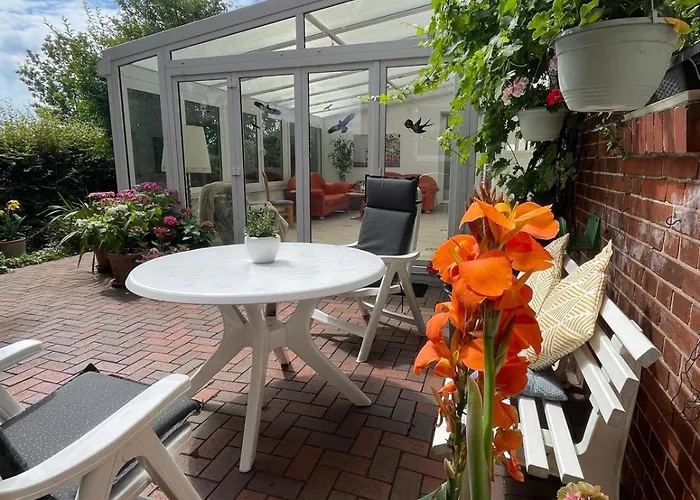 Ferienwohnung Mit Wintergarten In Bahnhofsnaehe